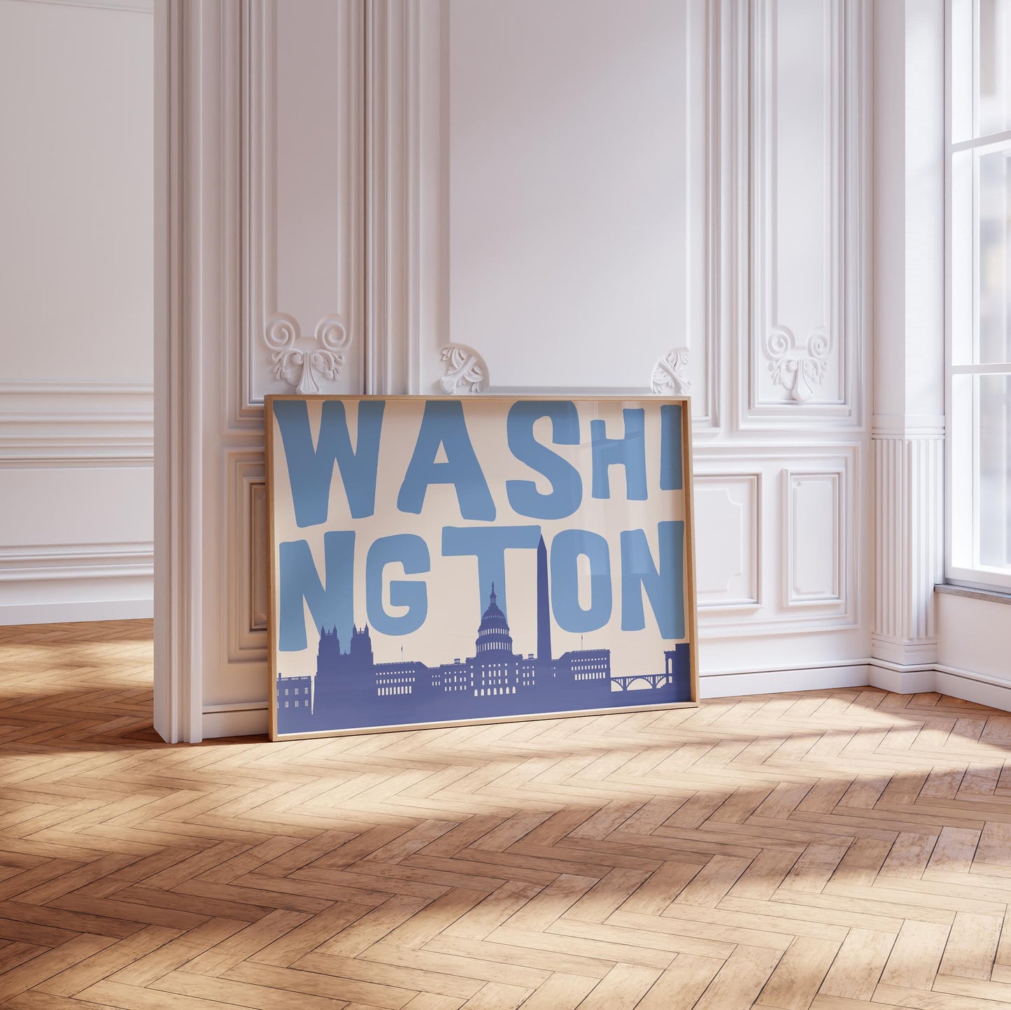 A modern graphic print of the Washington DC skyline, including the Capitol Building. The word 'WASHINGTON' is in large blue letters above the cityscape.