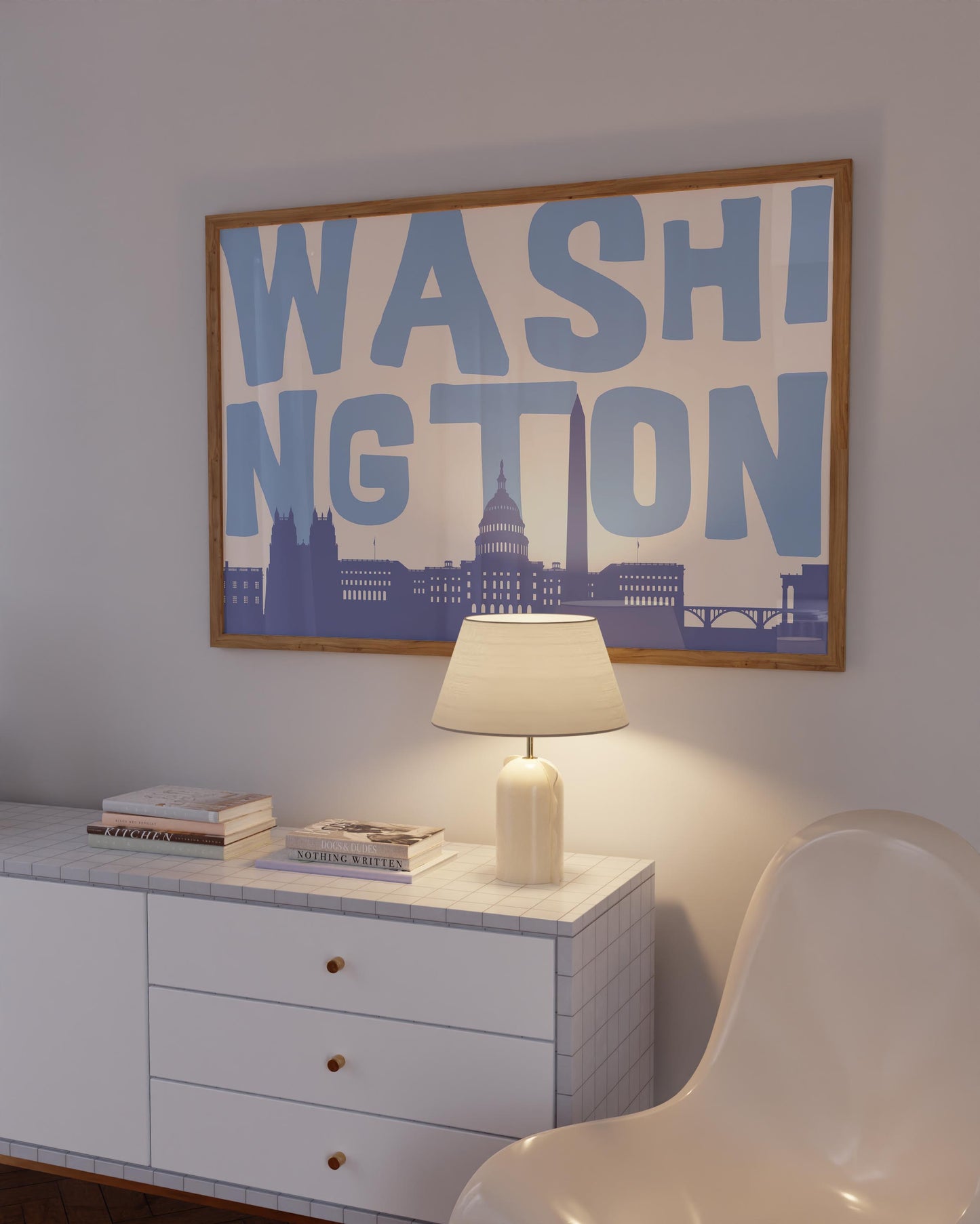 A modern graphic print of the Washington DC skyline, including the Capitol Building. The word 'WASHINGTON' is in large blue letters above the cityscape.