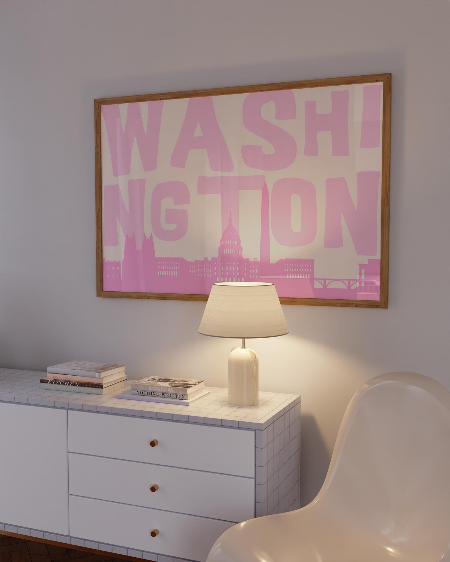 A modern graphic print of the Washington DC skyline in shades of pink. The word 'WASHINGTON' is in large light pink letters above the cityscape.