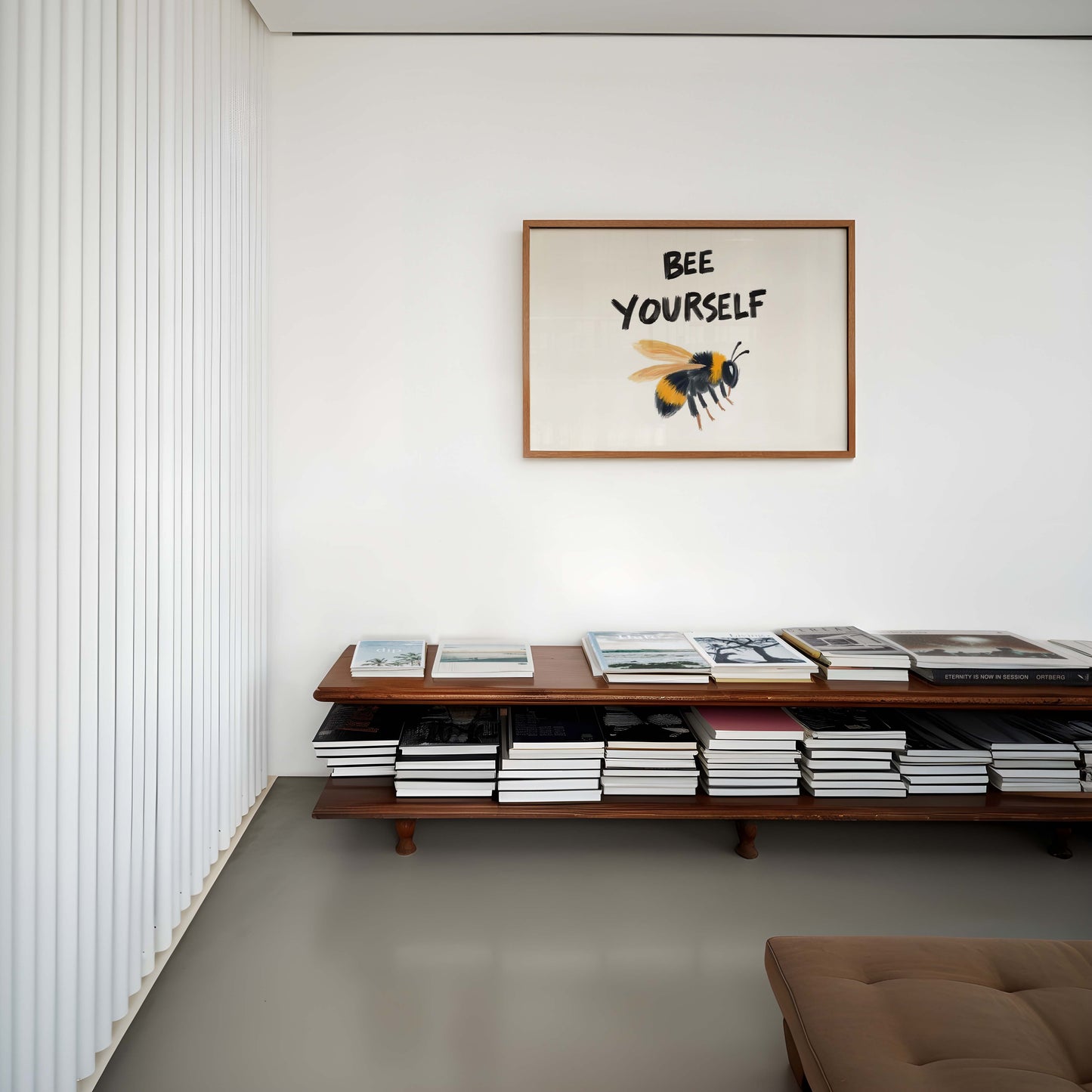 An inspirational bee print in a landscape frame, featuring a painterly bumblebee illustration under the quote 'Bee Yourself'.