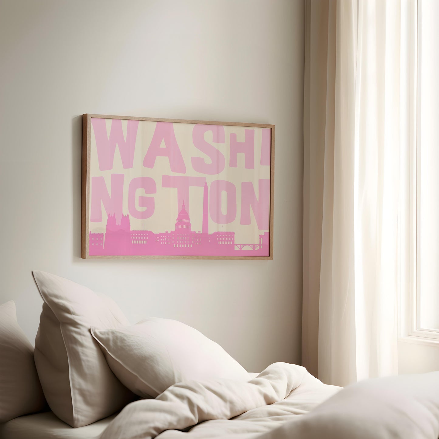 A modern graphic print of the Washington DC skyline in shades of pink. The word 'WASHINGTON' is in large light pink letters above the cityscape.