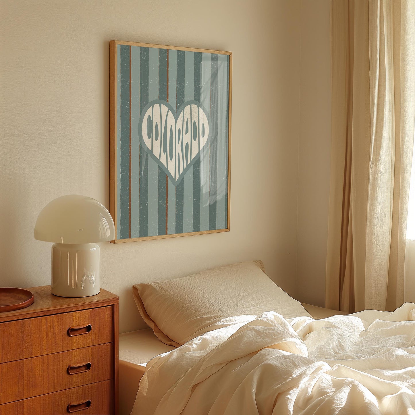 Colorado written in white text inside a heart shape on a background of vertical muted blue and brown stripes.