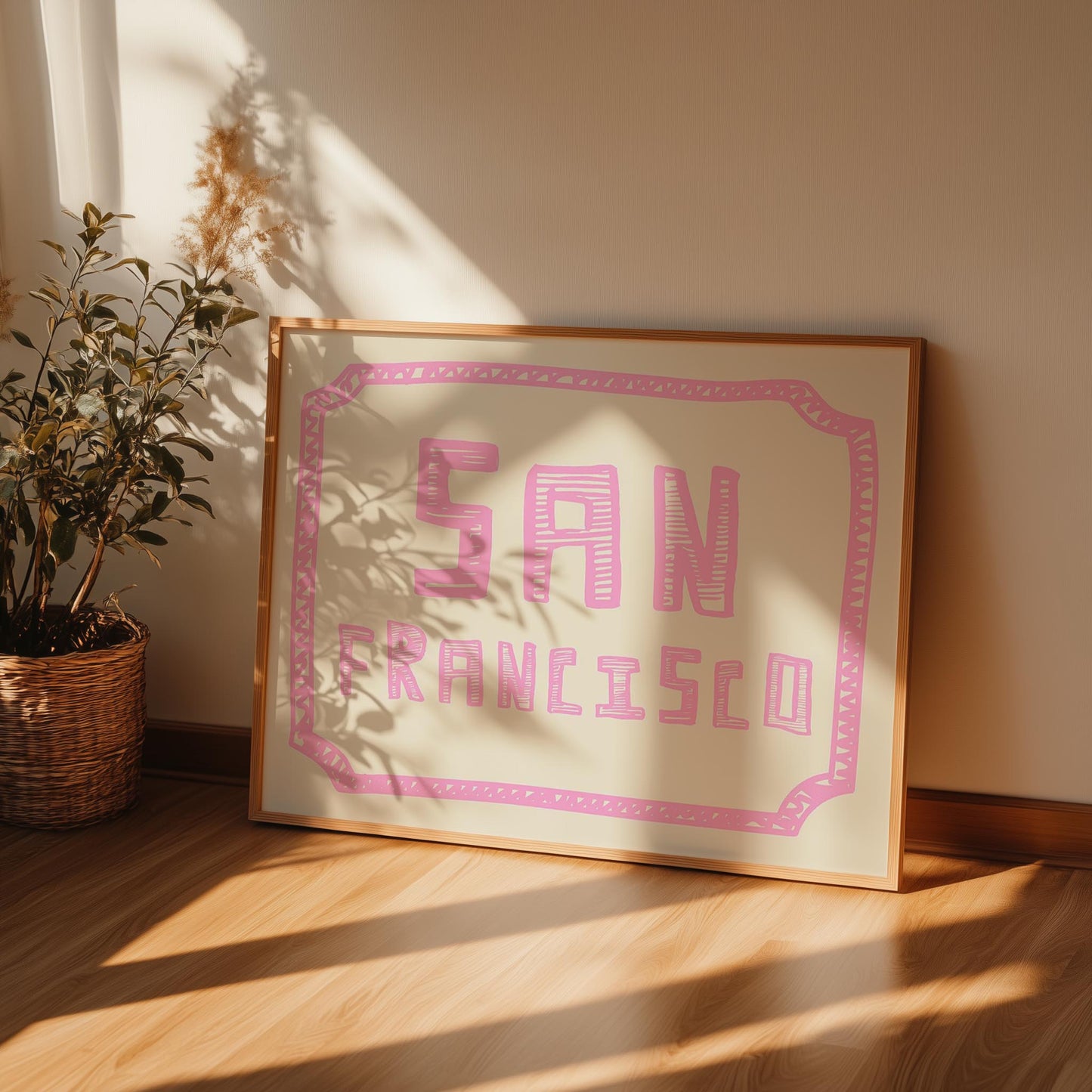 The words 'San Francisco' in a funky, hand-drawn block font. Retro pink printable wall art on a cream background with a doodle border.