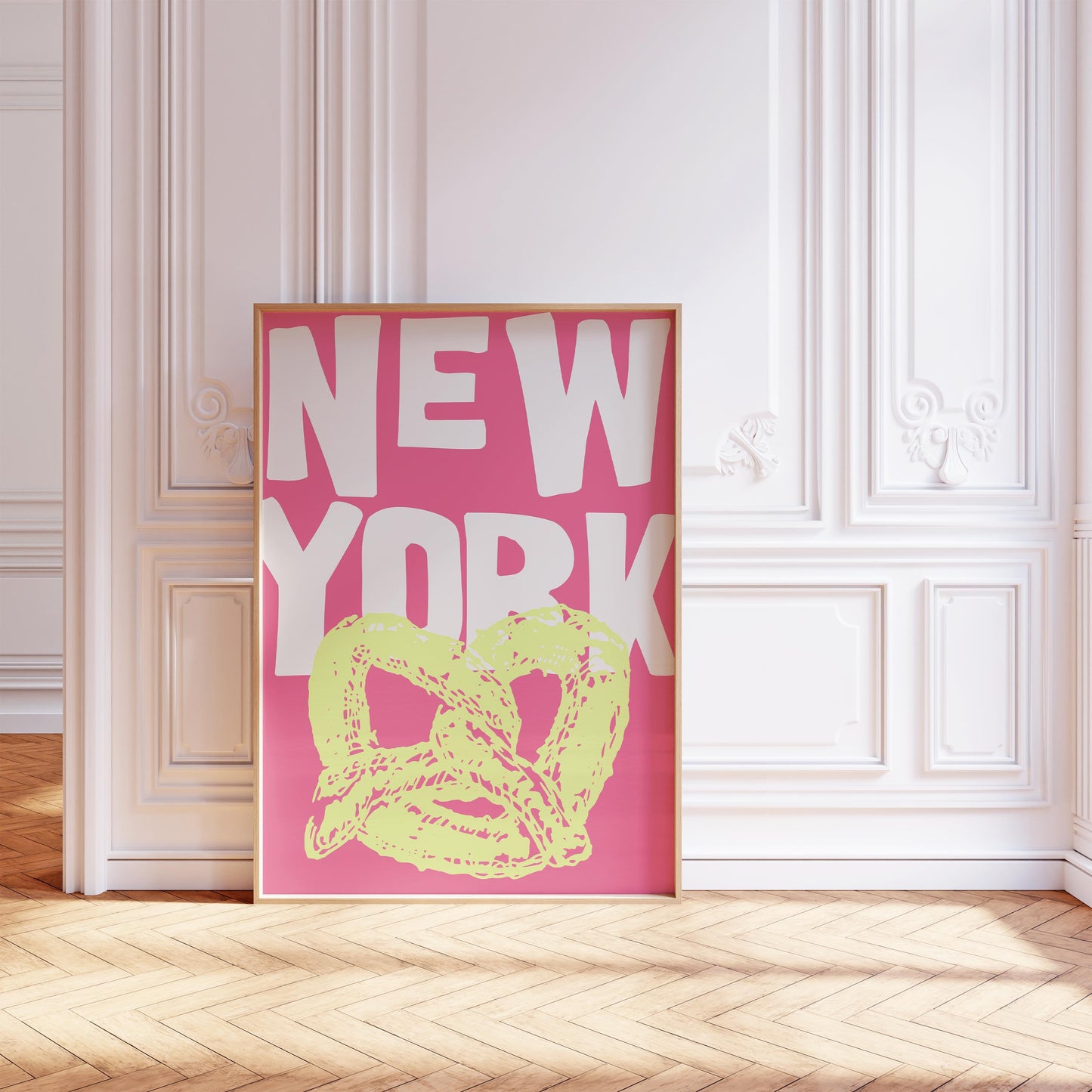 Funky pop art poster of a New York pretzel. The printable wall art has a yellow pretzel illustration against a bright pink background.