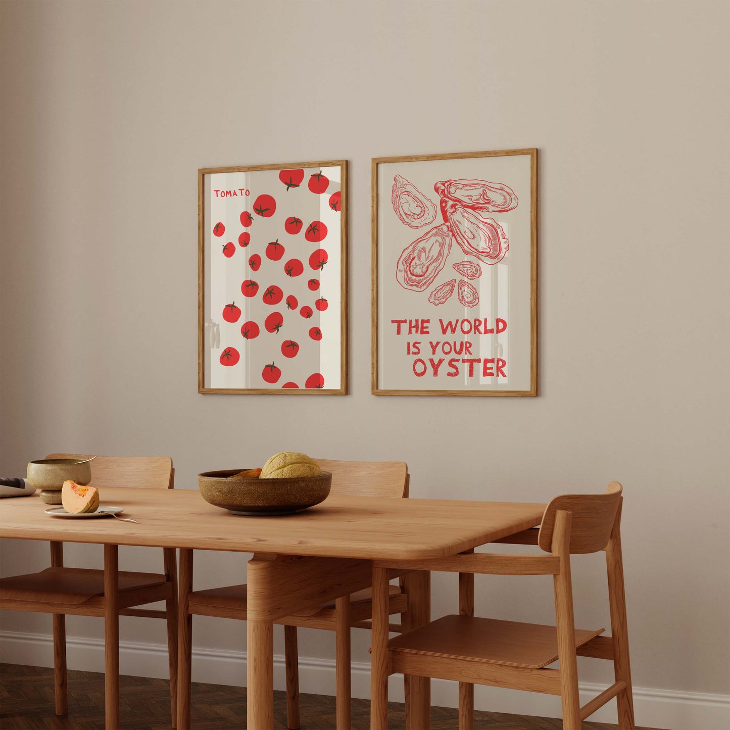 Set of two red and white kitchen prints. One features a pattern of tomatoes, the other has oysters and a quote. Minimalist foodie wall art.