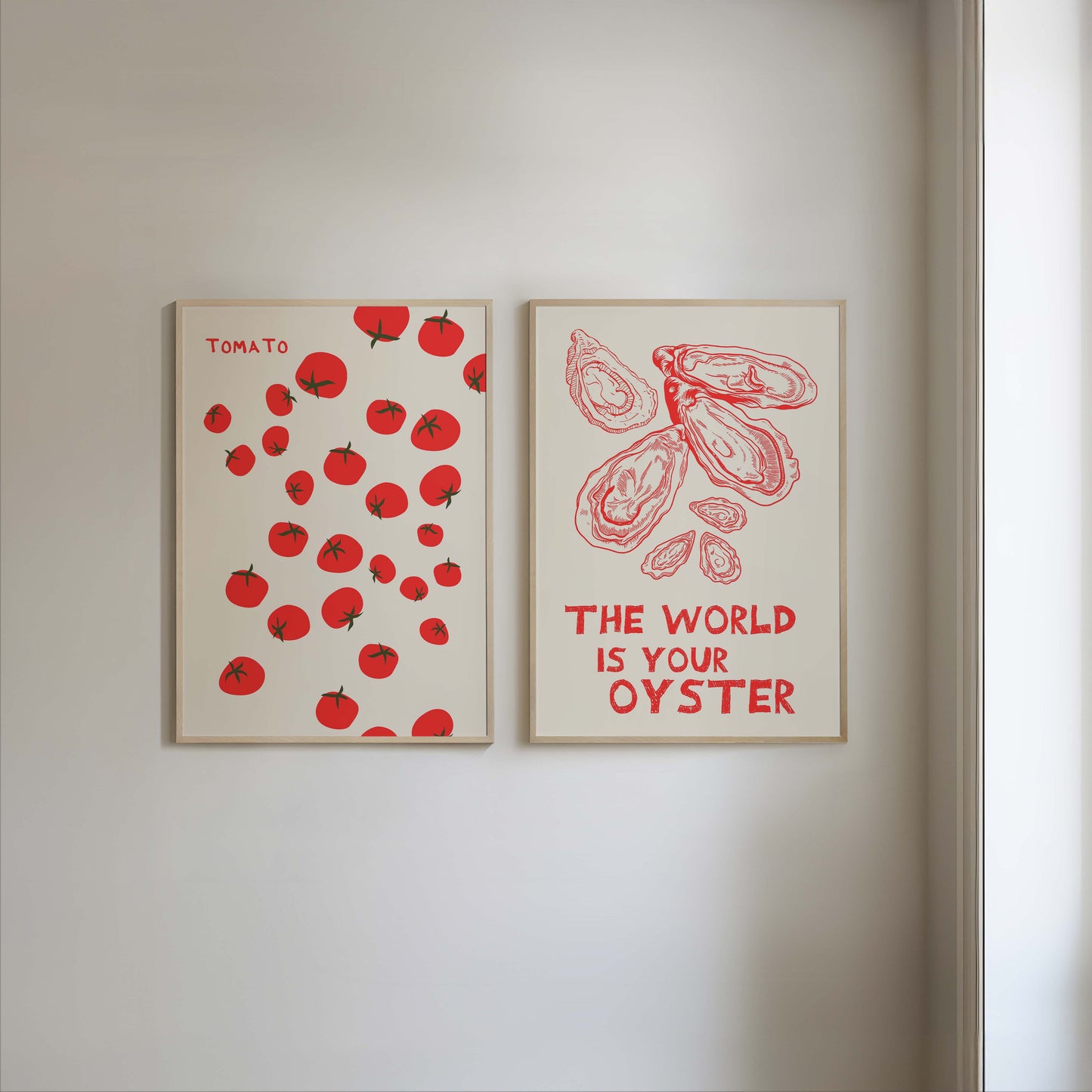 Set of two red and white kitchen prints. One features a pattern of tomatoes, the other has oysters and a quote. Minimalist foodie wall art.