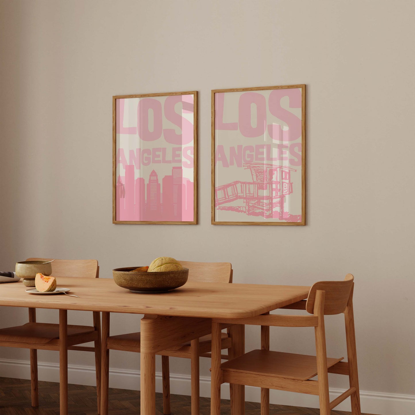 Set of two printable Los Angeles posters in pastel pink. Features the LA skyline and a lifeguard tower, perfect for a California gallery wall.