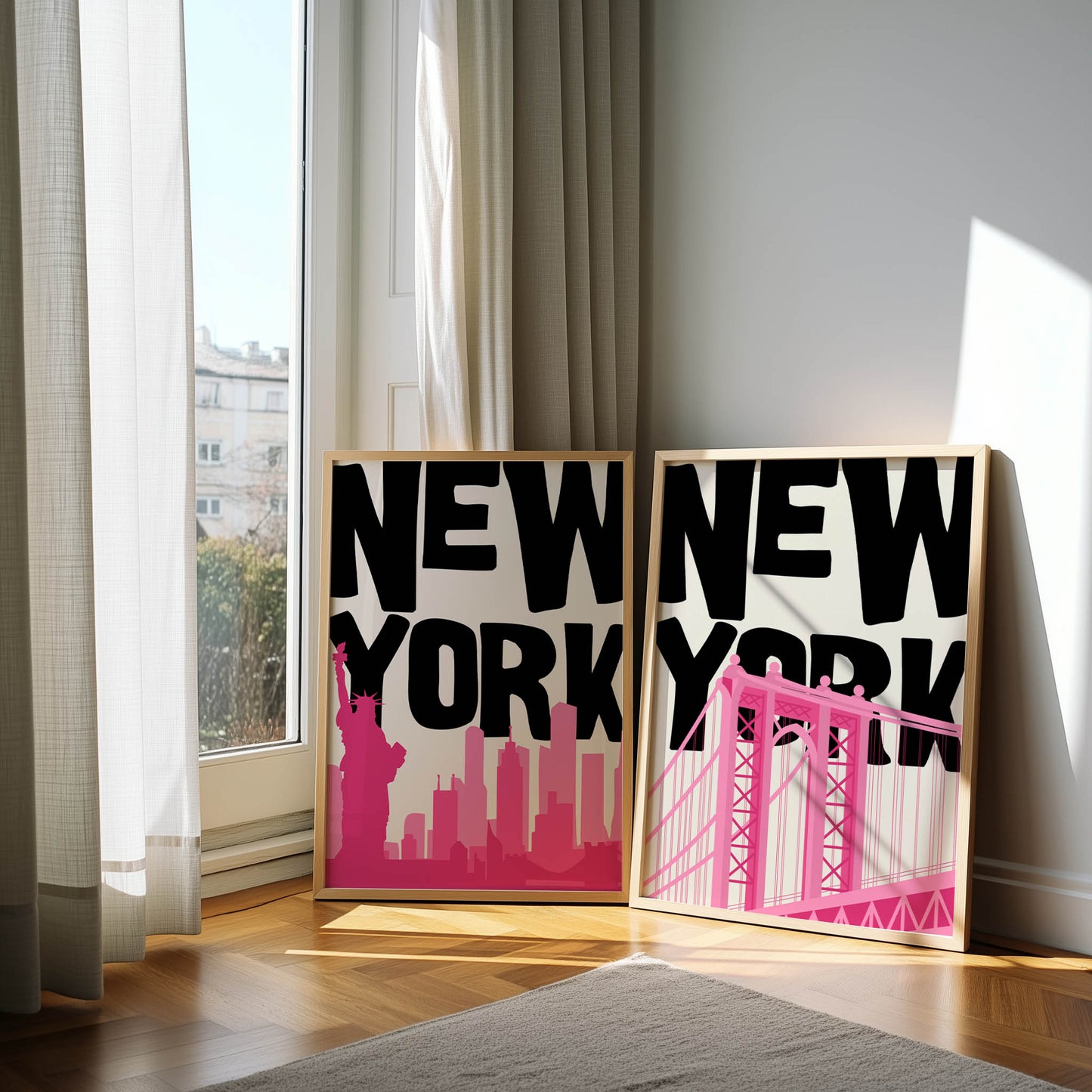 Set of two pop art NYC prints in bold black and pink. Printable wall art features the Manhattan Bridge and the Statue of Liberty.