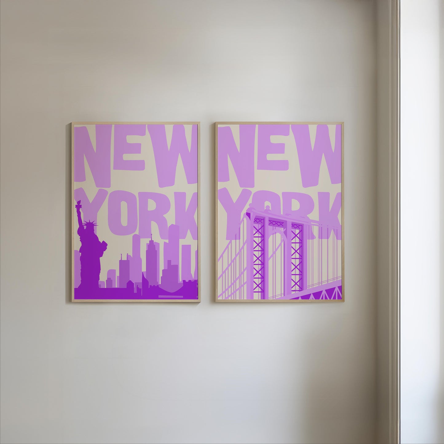 Set of two printable wall art posters of New York City in a bold purple and beige color palette with modern typography.