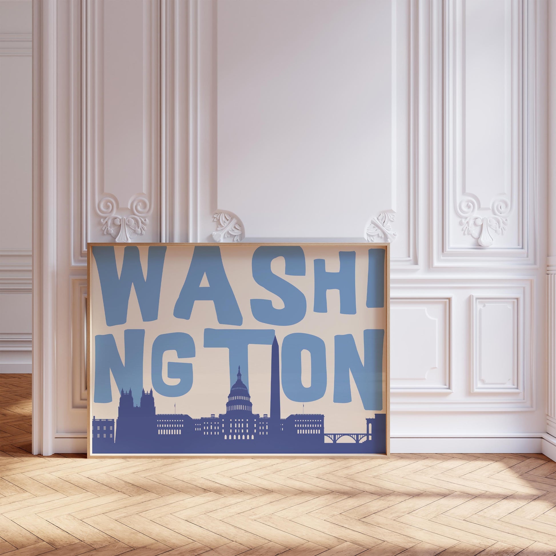 A modern graphic print of the Washington DC skyline, including the Capitol Building. The word 'WASHINGTON' is in large blue letters above the cityscape.