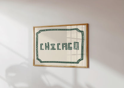 The word 'CHICAGO' in a funky, hand-drawn block font. Retro green printable wall art on a cream background, framed by a sketchy border.