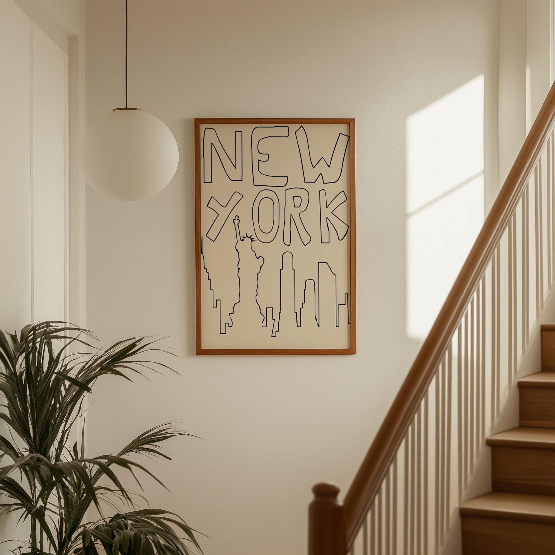 Minimalist NYC line art print leaning against a white wall. The black and beige printable poster features a quirky, hand-drawn skyline.