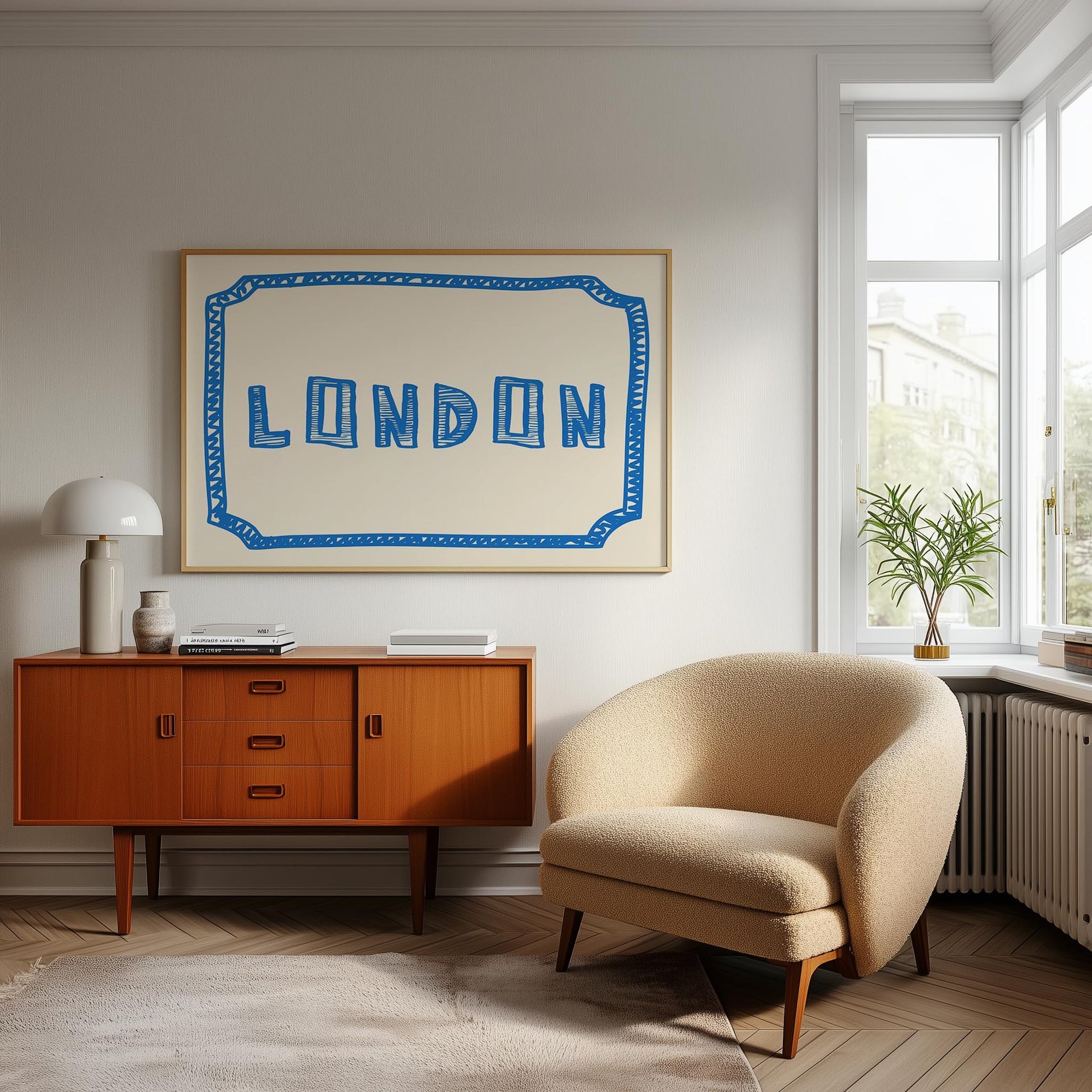 The word 'LONDON' in a funky, hand-drawn block font. Retro blue printable wall art on a cream background, framed by a sketchy border.