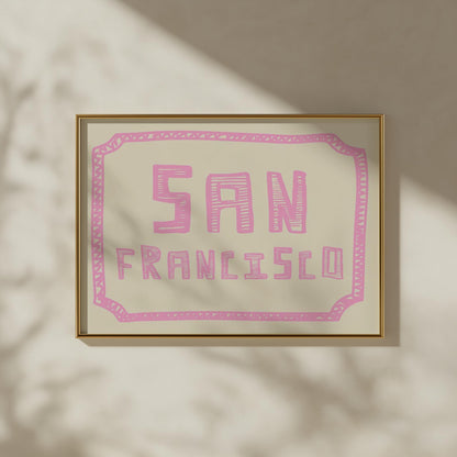 The words 'San Francisco' in a funky, hand-drawn block font. Retro pink printable wall art on a cream background with a doodle border.