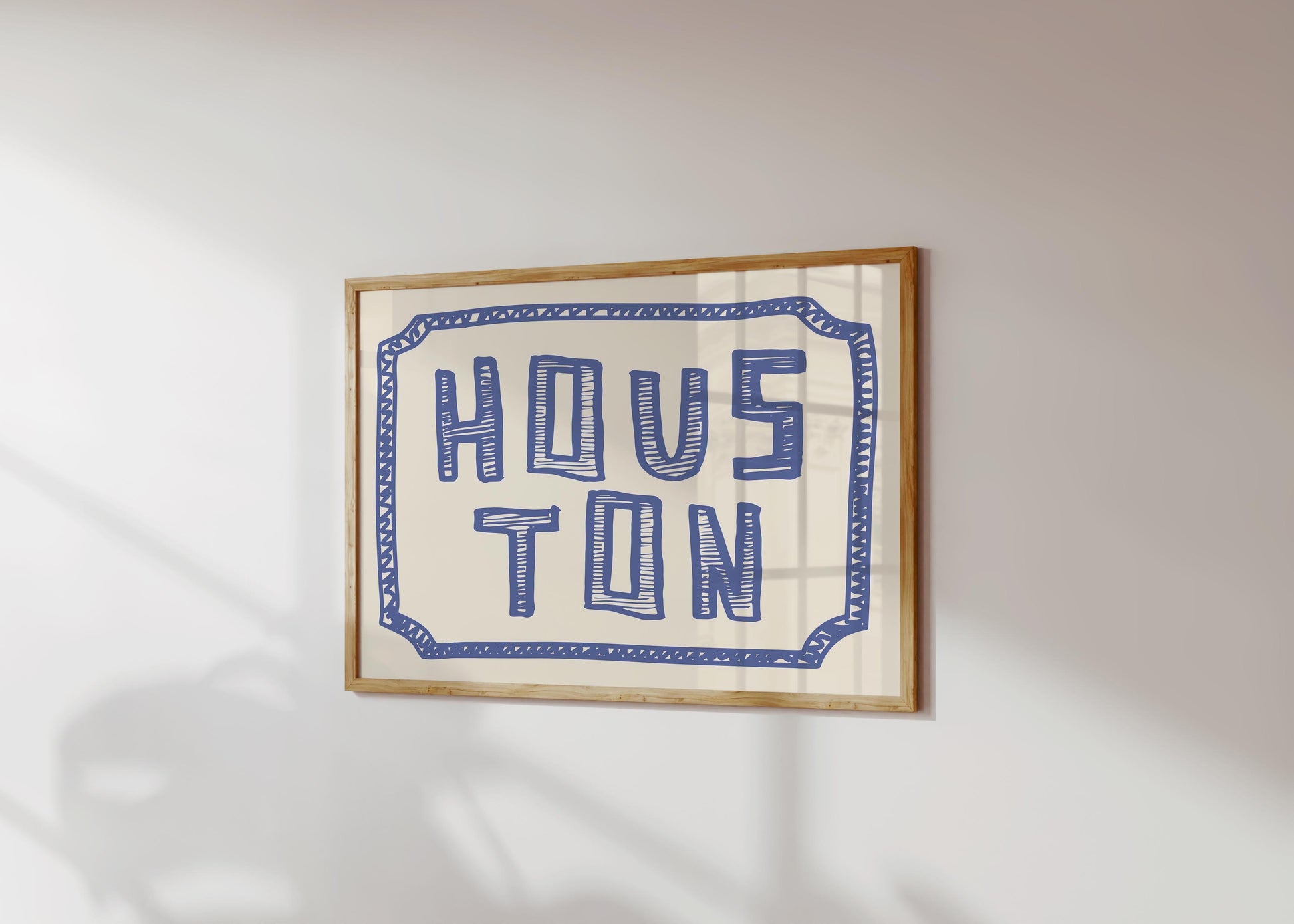The word 'HOUSTON' in a funky, hand-drawn block font. Retro blue printable wall art on a cream background, framed by a doodle border.