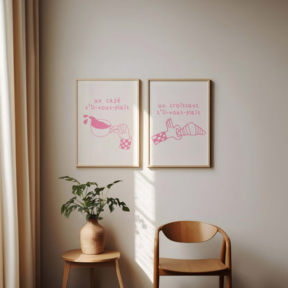 Set of two pink French cafe prints. One features a croissant, the other coffee, with French text. Quirky printable kitchen wall art.
