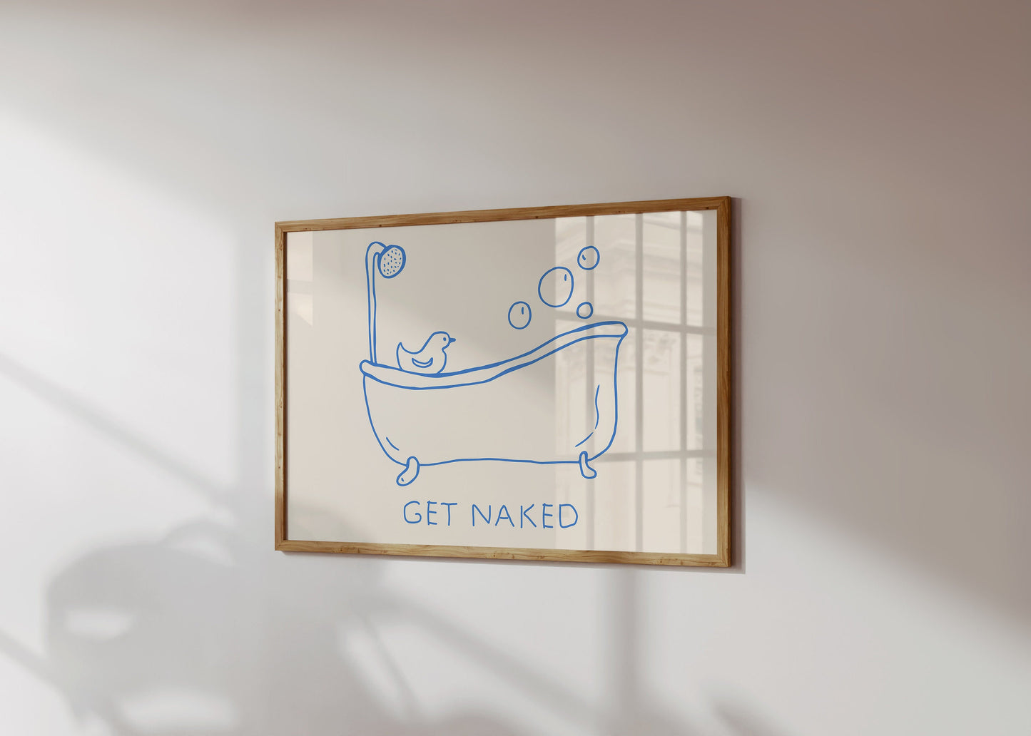 Hand-drawn blue line art of a bathtub with bubbles and a rubber duck, with text "GET NAKED" below.