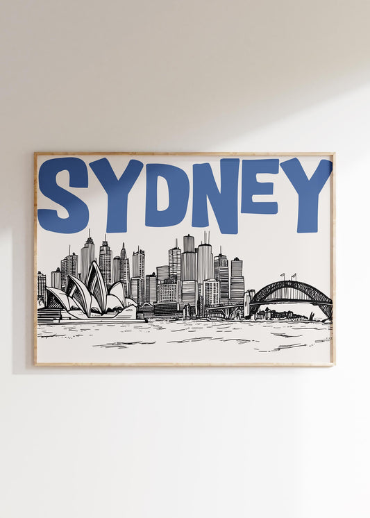Modern Sydney wall art showing a sketch of the skyline and Opera House below the word 'SYDNEY' in bold blue font.