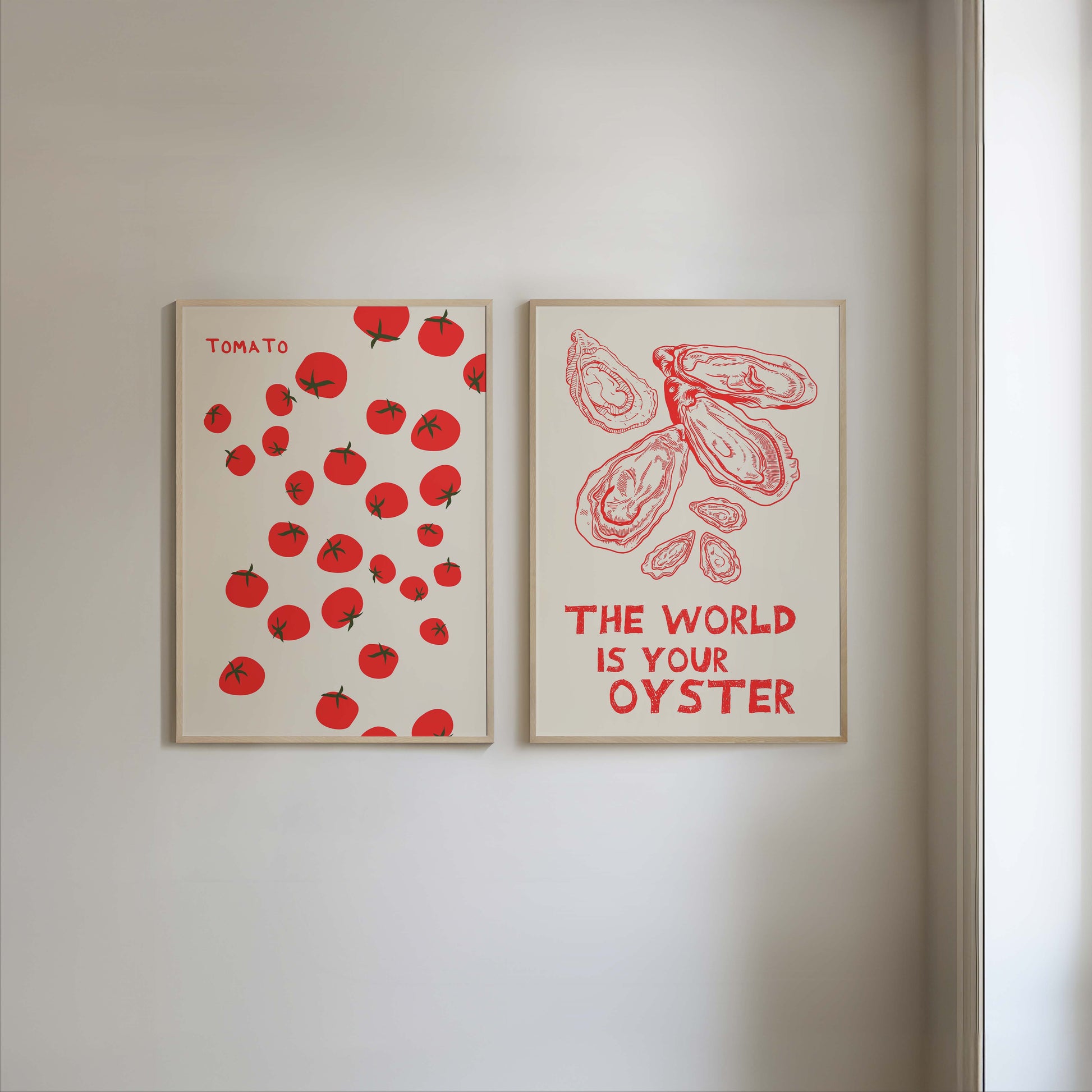 Set of two red and white kitchen prints. One features a pattern of tomatoes, the other has oysters and a quote. Minimalist foodie wall art.