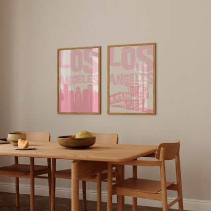 Set of two printable Los Angeles posters in pastel pink. Features the LA skyline and a lifeguard tower, perfect for a California gallery wall.